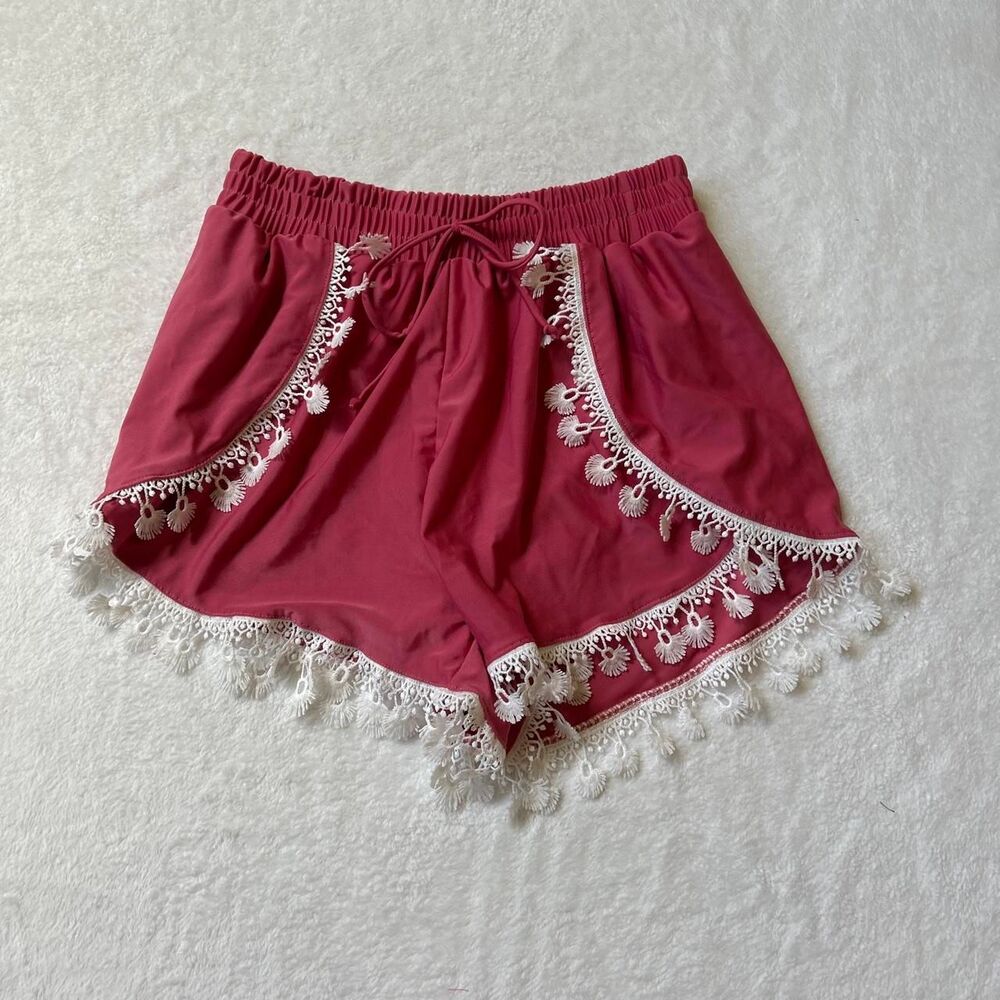 pink boho festival swim shorts with white lace trim and tassels women's small